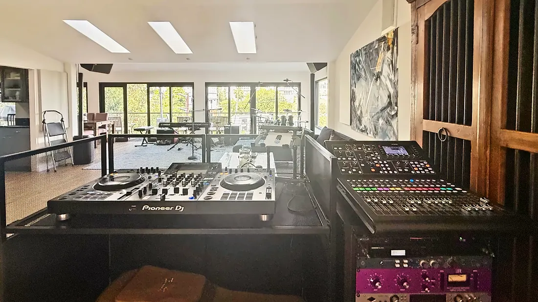 Pioneer DJ system and digital mixer in a built-in booth