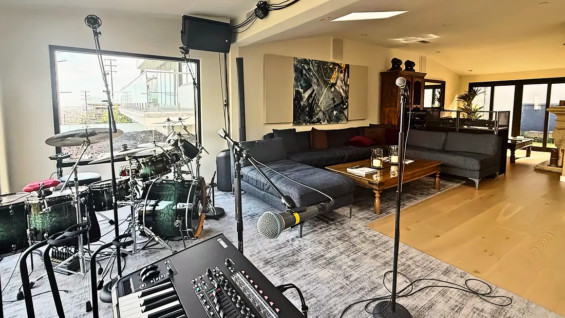 Drum kit and keys beside the main lounge